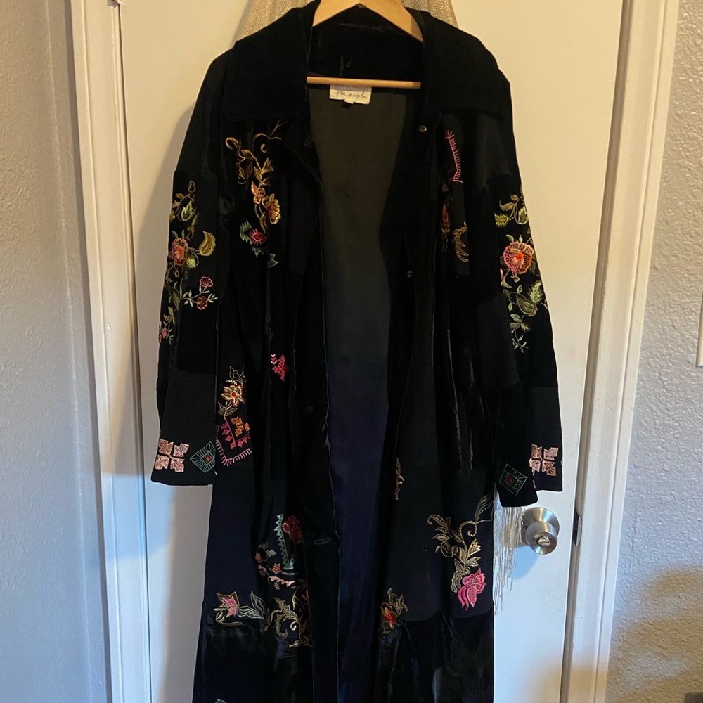 Free People exclusive black embroidered duster coat.